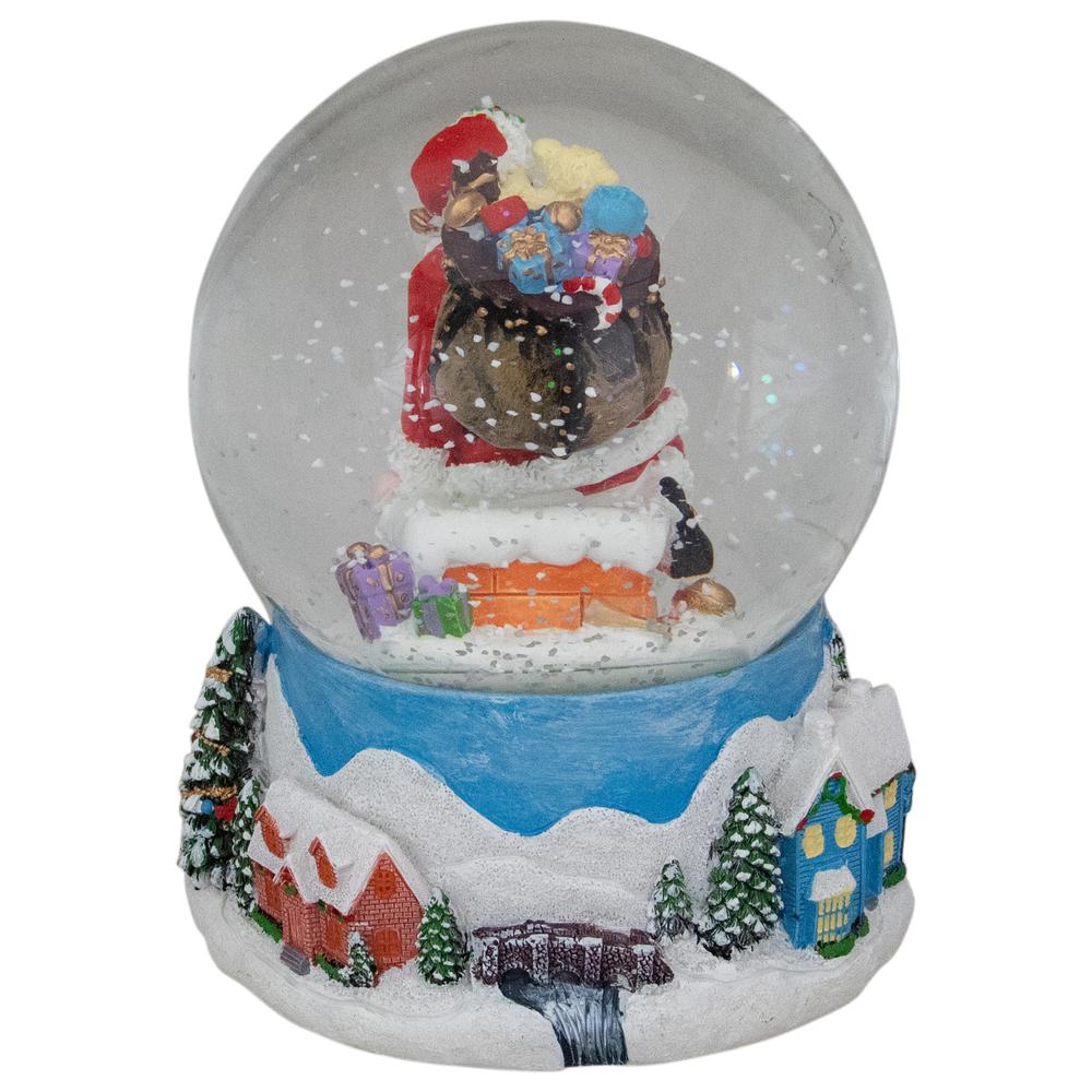 6.5" Santa Coming Down the Chimney Christmas Snow Globe. Picture 3
