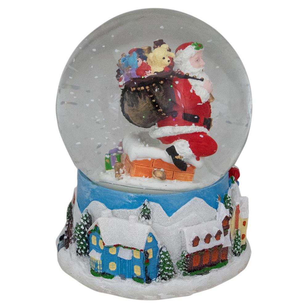 6.5" Santa Coming Down the Chimney Christmas Snow Globe. Picture 4