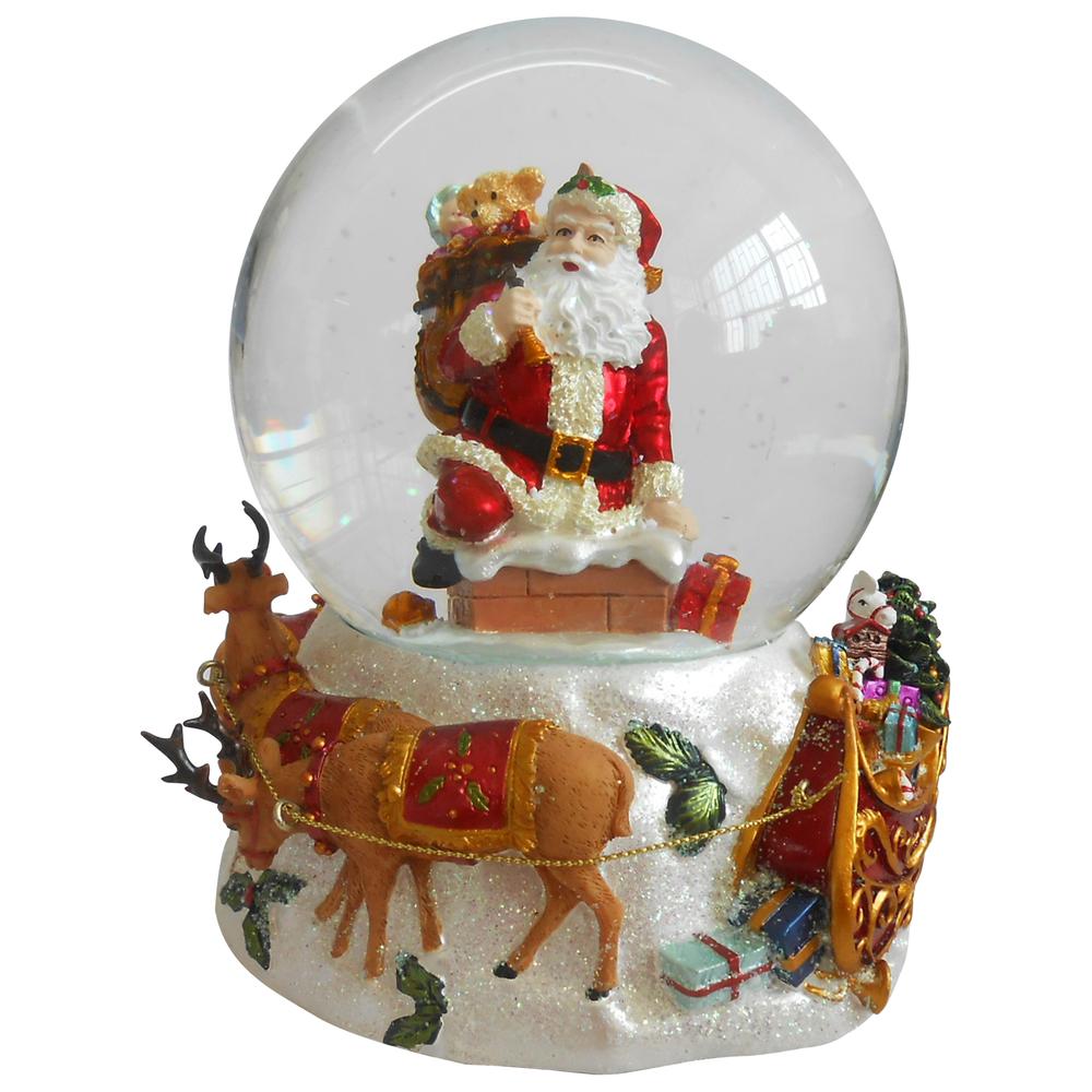 6.75" Santa Going Down the Chimney Musical Christmas Snow Globe. Picture 2