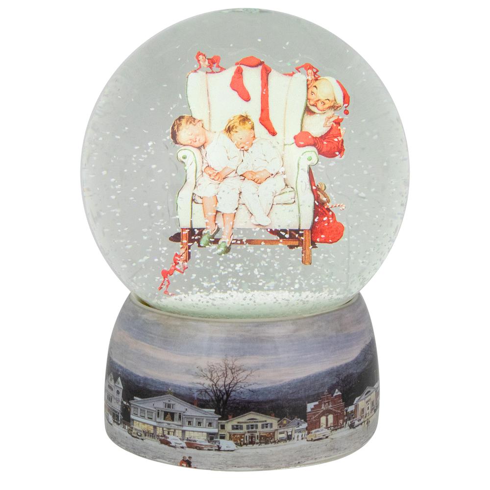 6.5" Norman Rockwell 'Santa Looking at Two Sleeping Children' Christmas Snow Globe. The main picture.