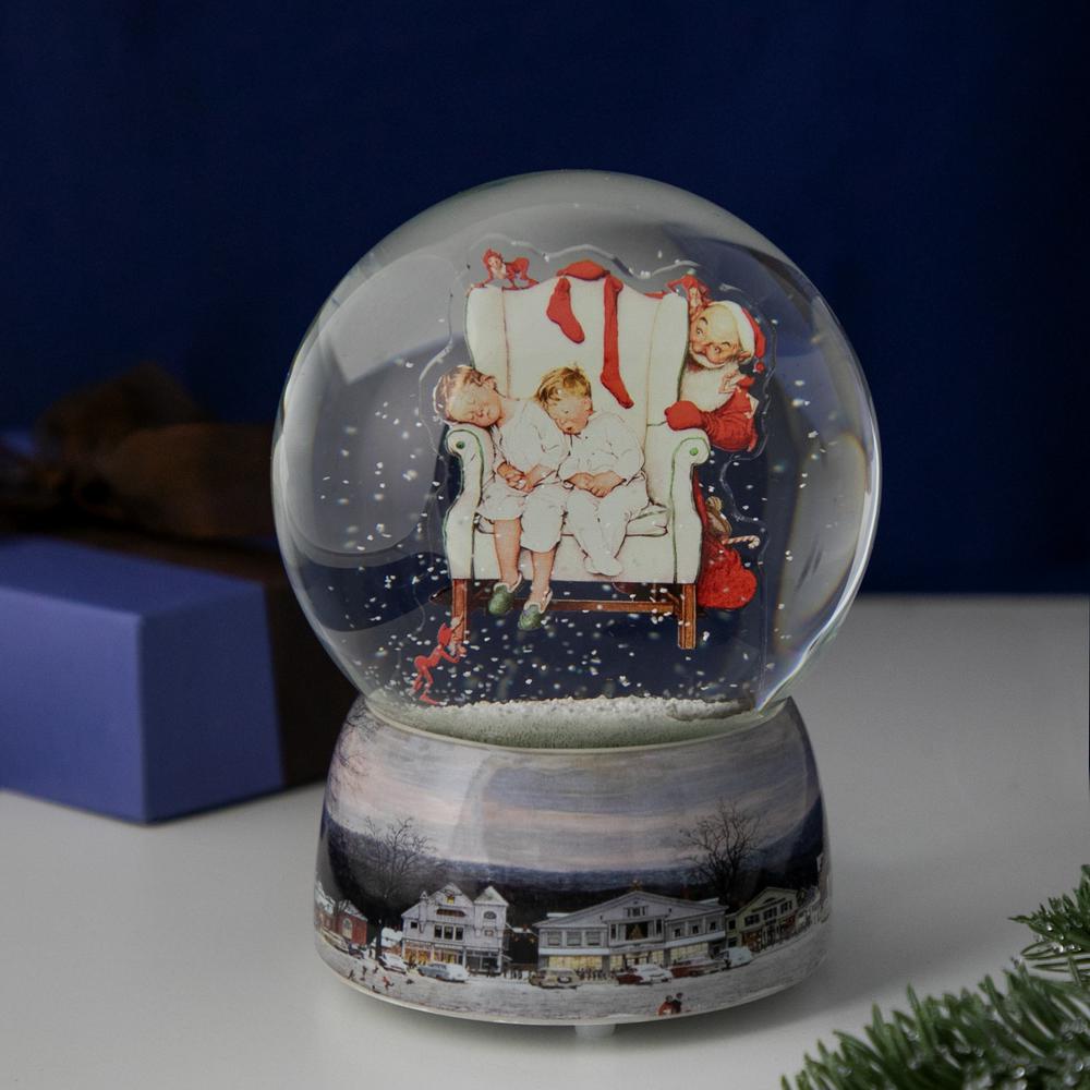 6.5" Norman Rockwell 'Santa Looking at Two Sleeping Children' Christmas Snow Globe. Picture 2