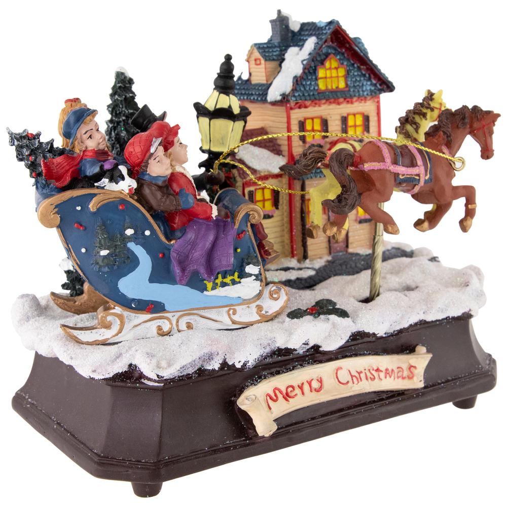 6.25" Animated and Musical Christmas Sleigh Decoration. Picture 3