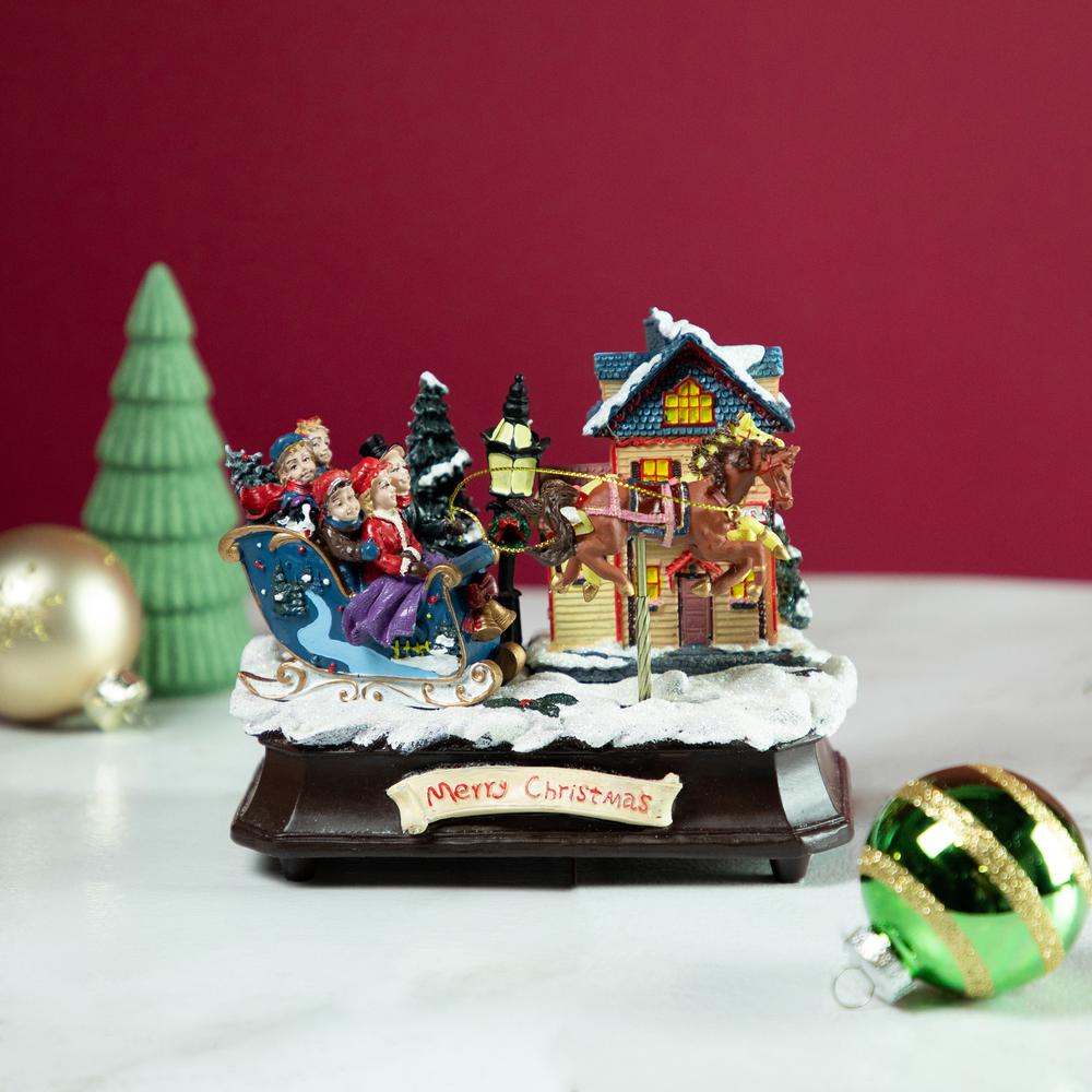 6.25" Animated and Musical Christmas Sleigh Decoration. Picture 2