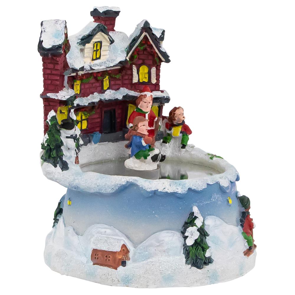 5.25" Animated and Musical Village Ice Skating Pond Christmas Scene. Picture 2