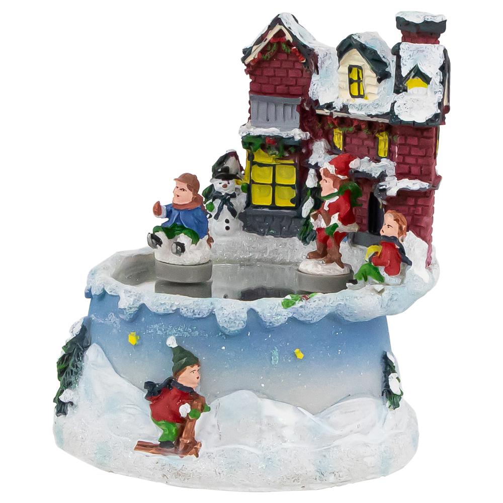 5.25" Animated and Musical Village Ice Skating Pond Christmas Scene. Picture 3