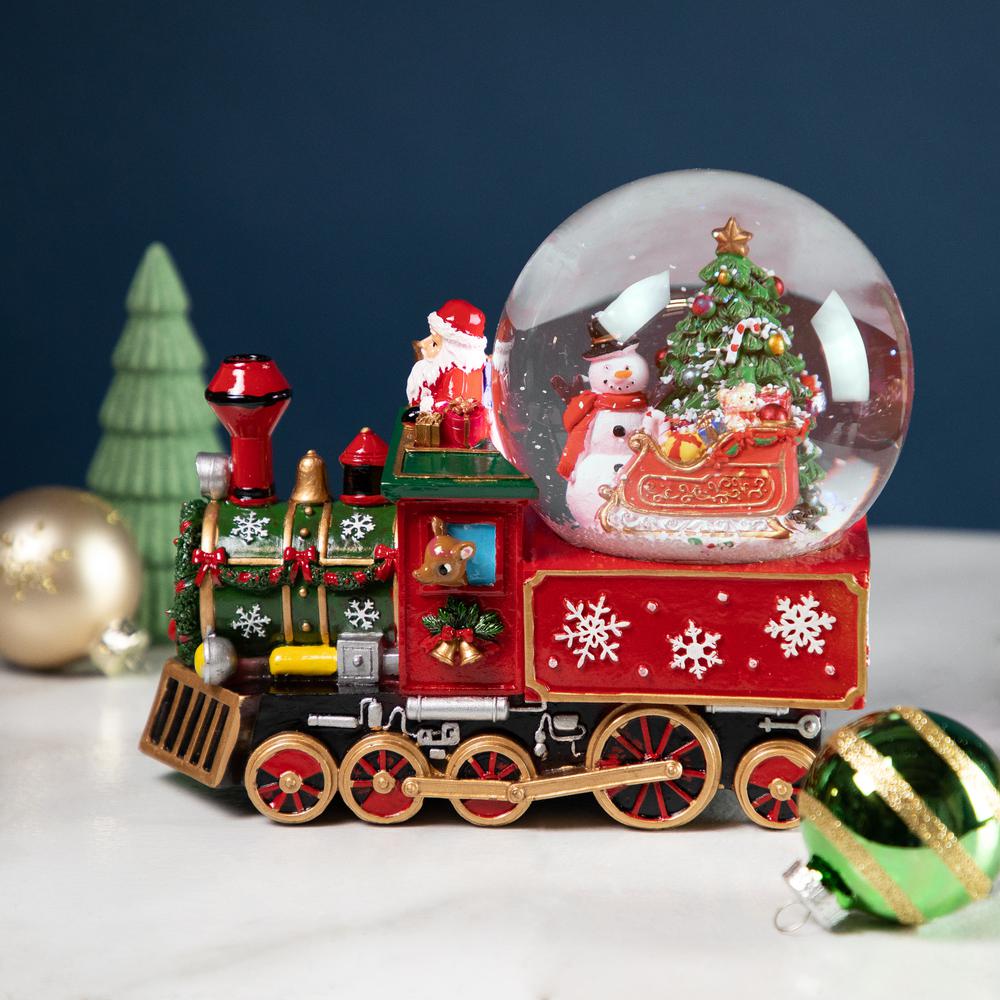 8.25" Santa Driving the Christmas Train Musical Snow Globe. Picture 2