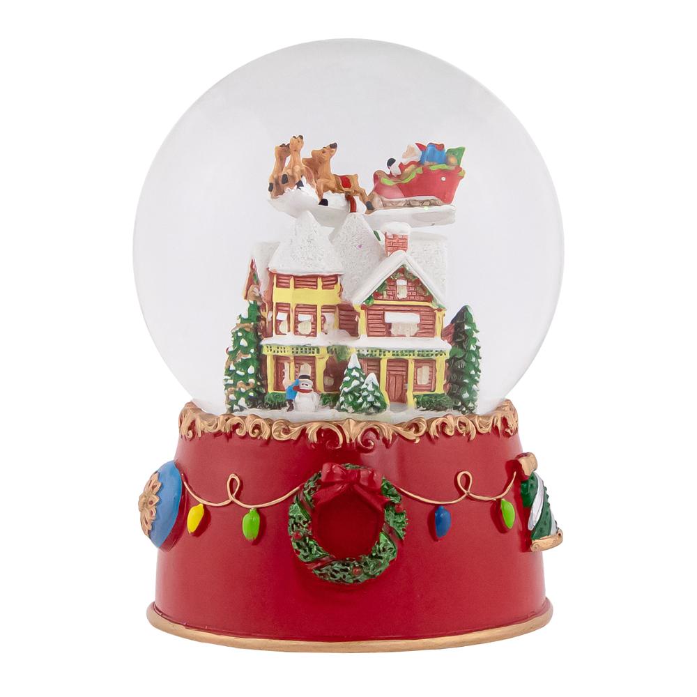 7" Santa and Reindeer Christmas Night Musical Snow Globe. Picture 1