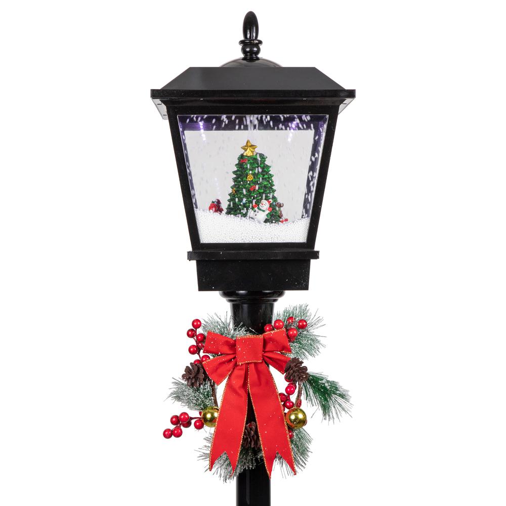 70.75" Lighted Musical Snowing Santa and Friends Christmas Street Lamp. Picture 3