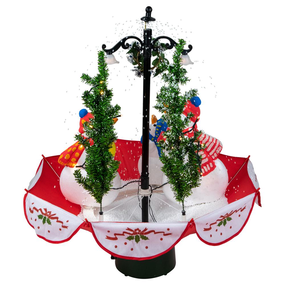 31" Musical Lighted Snowing Snowman Family in Umbrella Base Christmas Decoration. Picture 4
