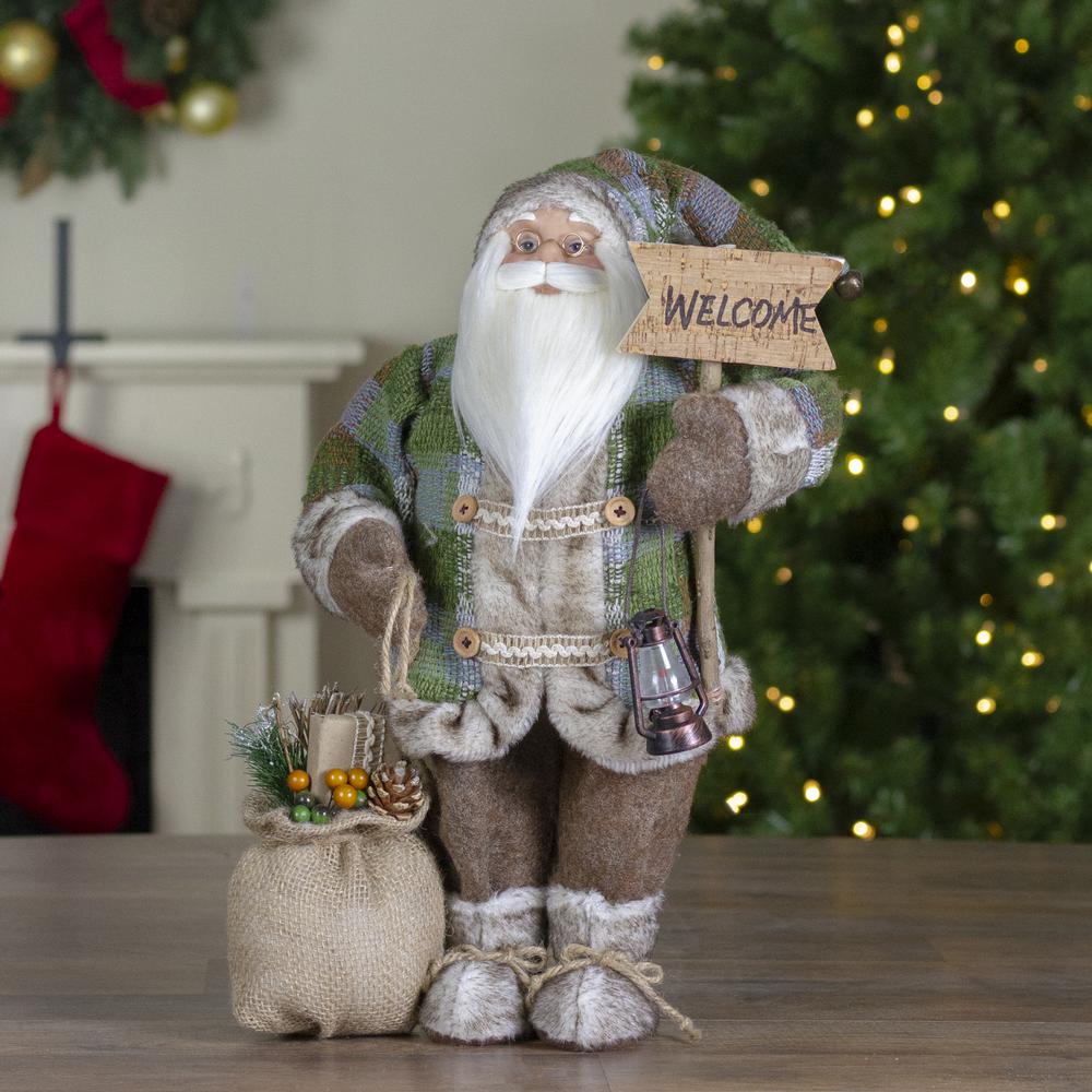 18" Standing Santa Christmas Figure Carrying a Welcome Sign. Picture 2