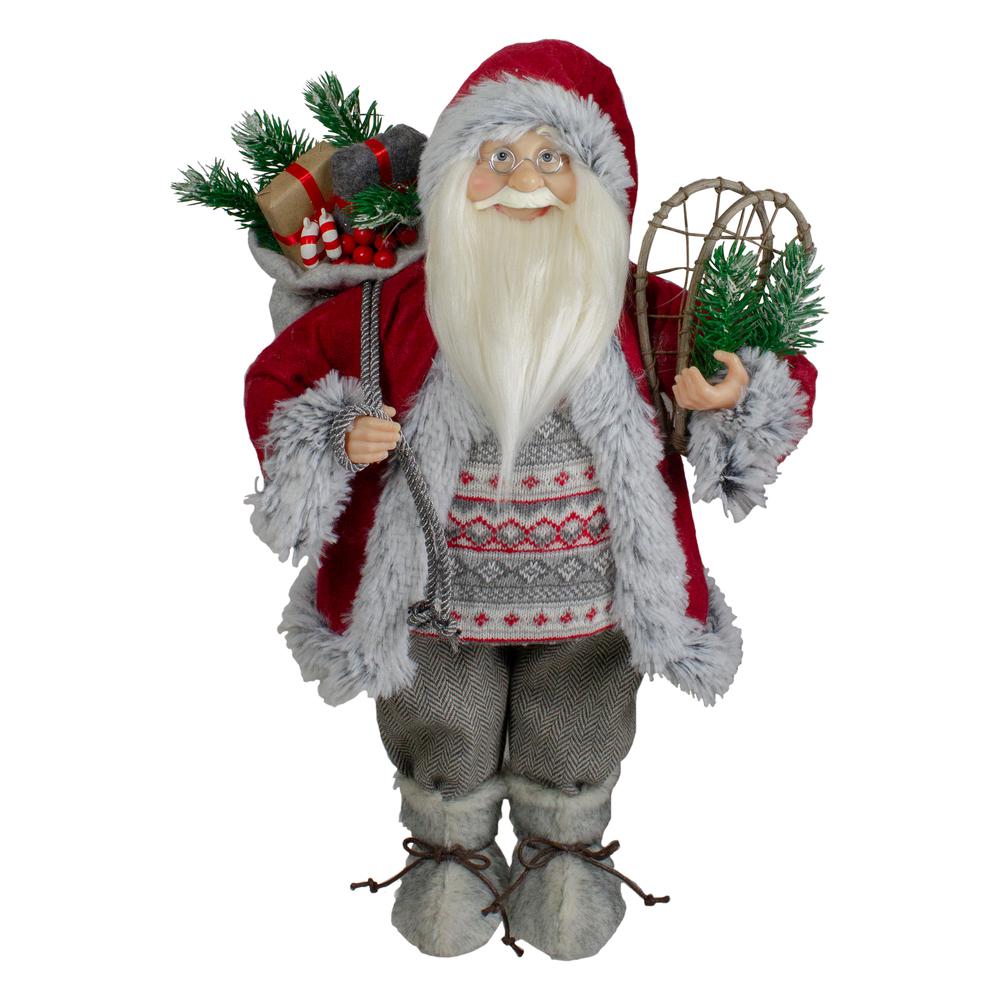 18" Standing Santa Christmas Figure with Snow Shoes and Presents. Picture 1