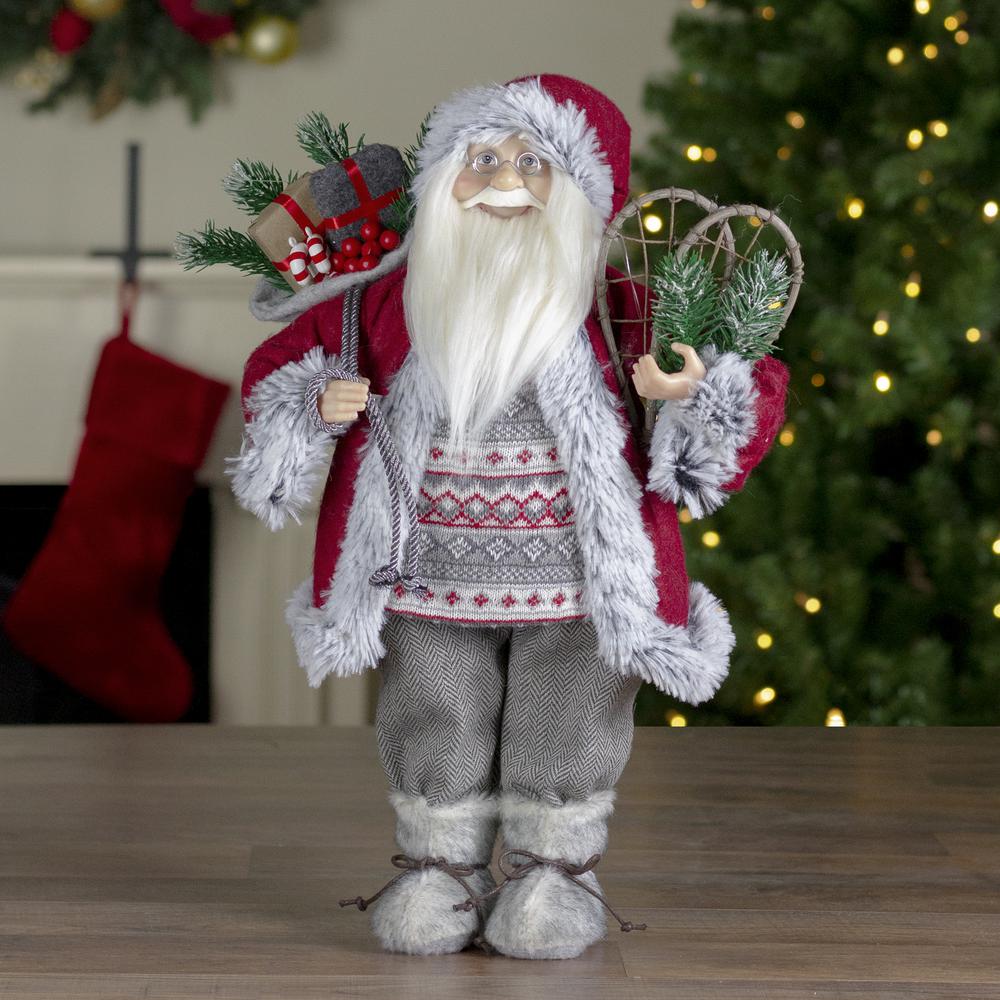 18" Standing Santa Christmas Figure with Snow Shoes and Presents. Picture 2