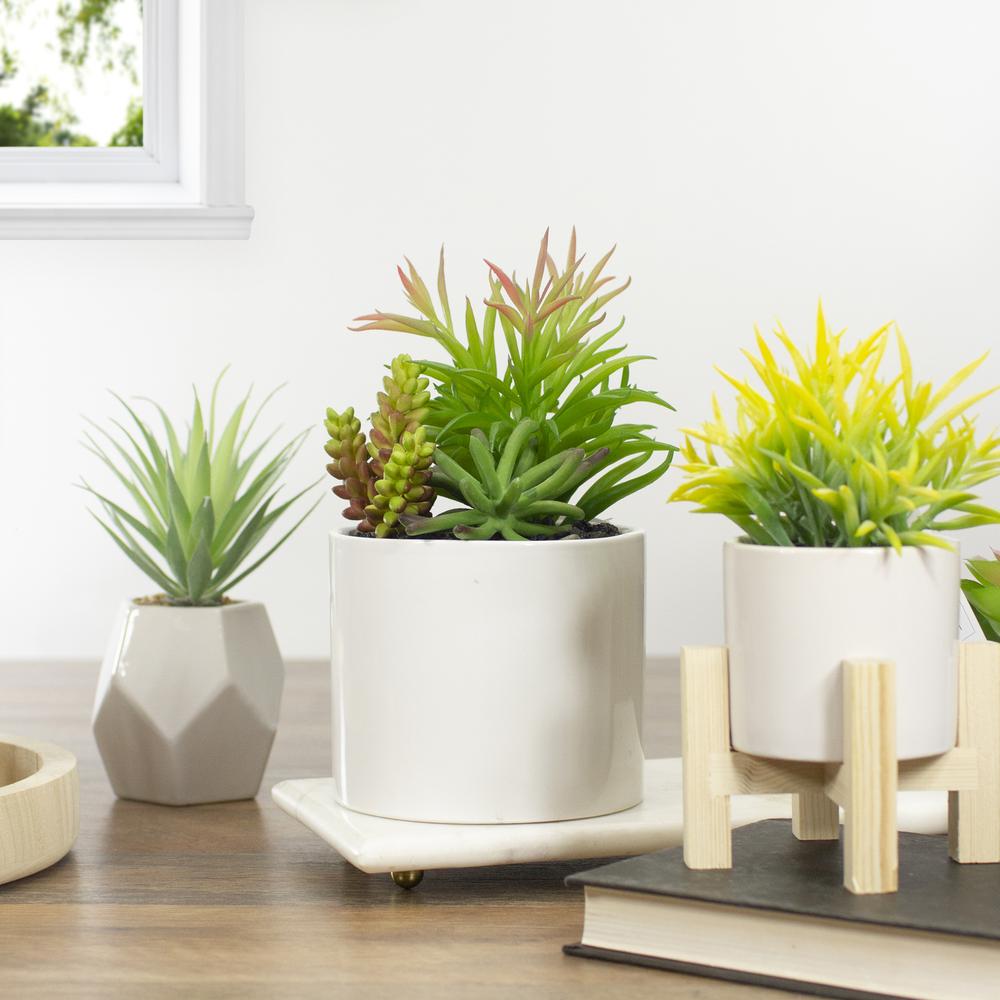 9" Artificial Succulent Arrangement in White Ceramic Pot. Picture 2