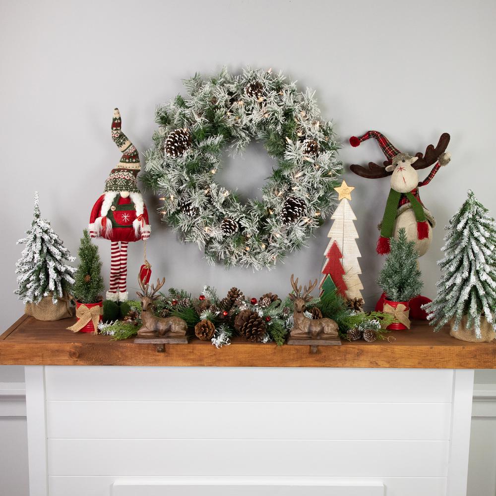 Heavily Flocked Madison Pine Artificial Christmas Wreath 24-Inch Clear Lights. Picture 2