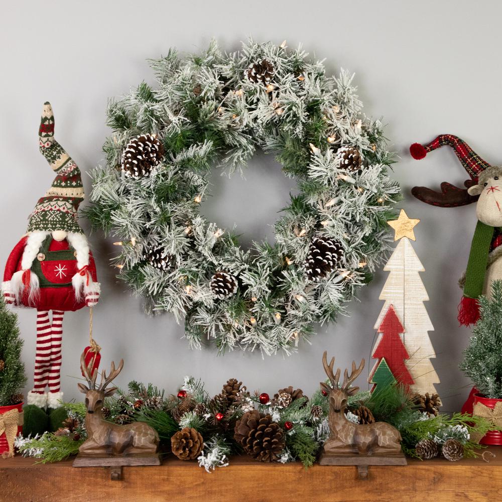Heavily Flocked Madison Pine Artificial Christmas Wreath 24-Inch Clear Lights. Picture 3