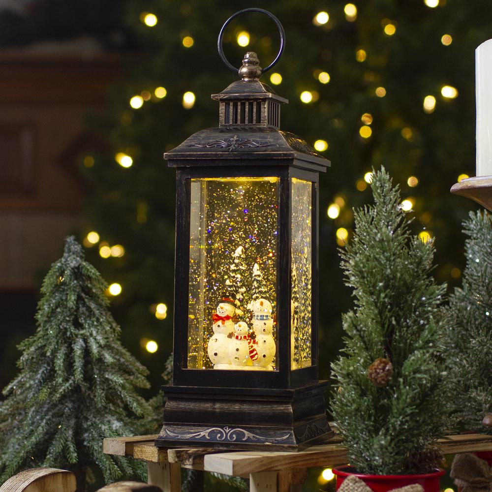 11" Black with Brushed Gold LED Snowman Family Christmas Lantern Snow Globe. Picture 2
