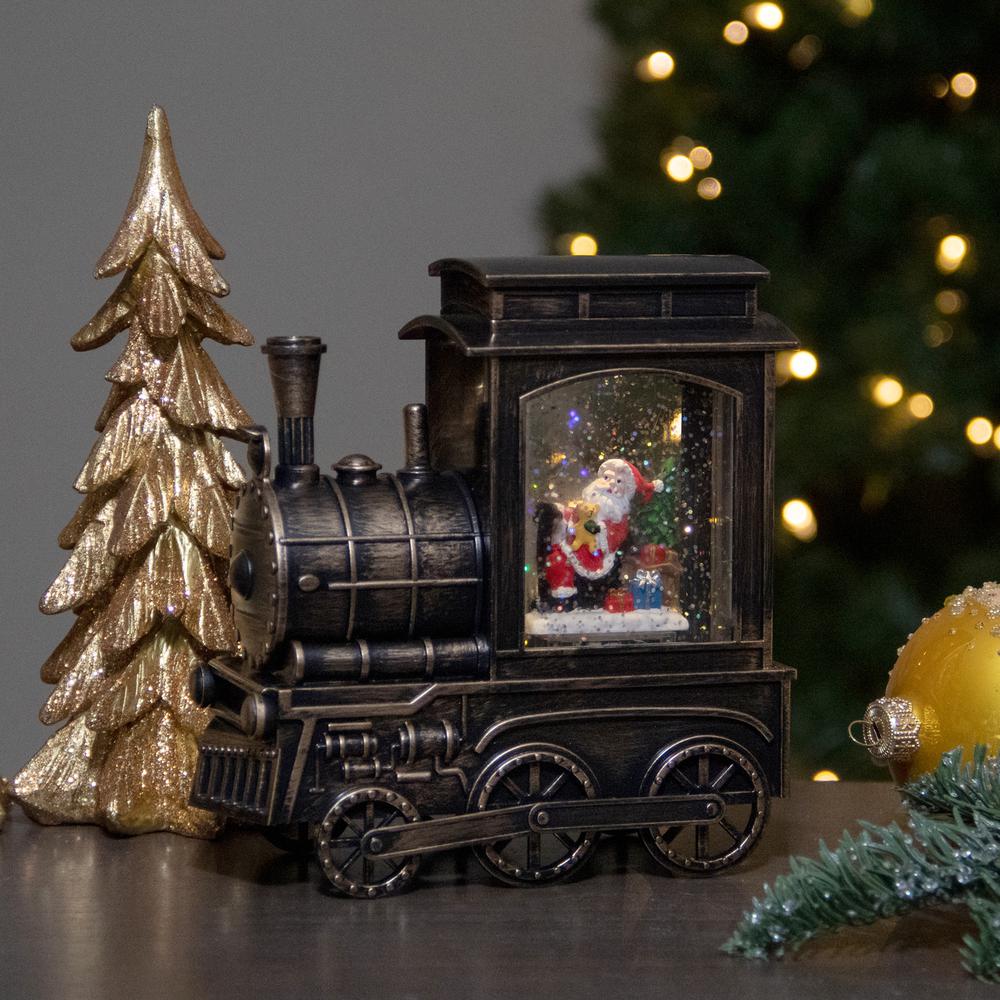 6.75" Lighted Black Train Christmas Snow Globe with Santa. Picture 2