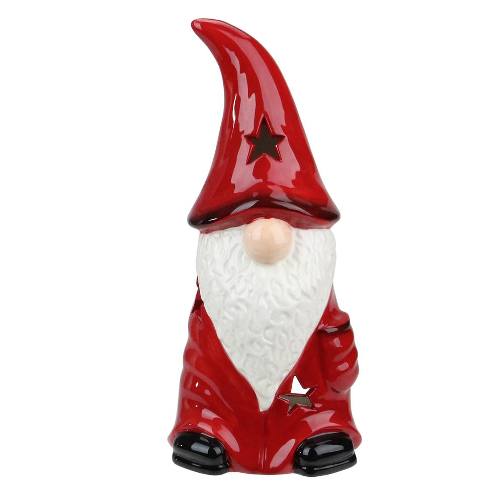 9.75 Red Ceramic Christmas Star Gnome Tealight Candle Holder. Picture 1