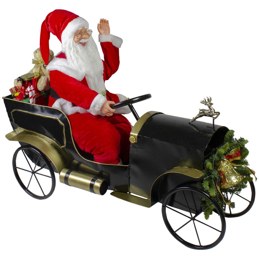 33" Santa Delivering Presents in a Black and Gold Car Christmas Decoration. Picture 1
