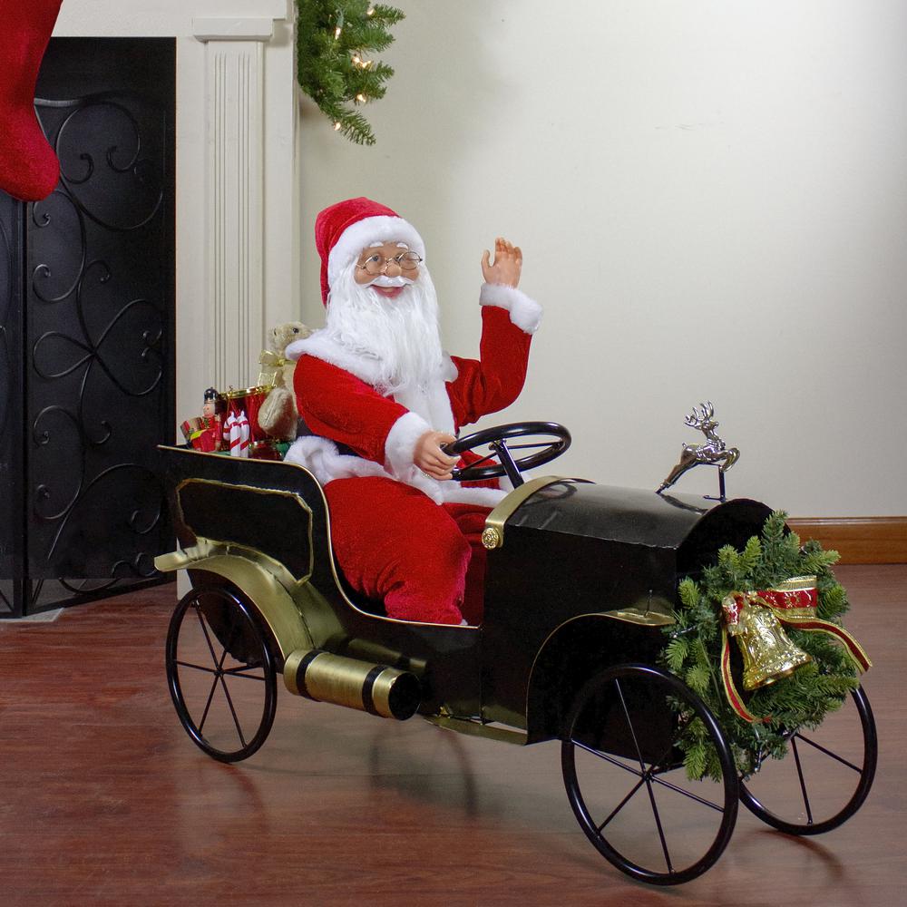 33" Santa Delivering Presents in a Black and Gold Car Christmas Decoration. Picture 2