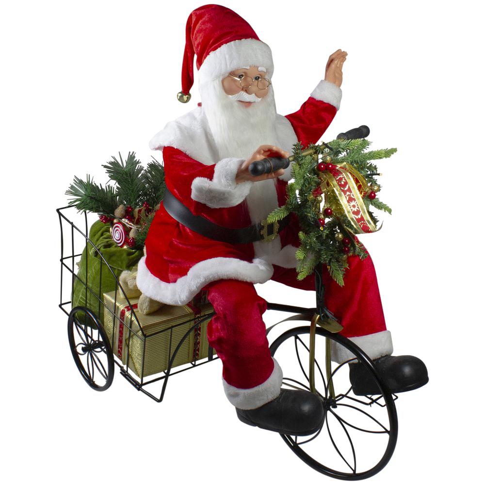 32" Pre-Lit LED Animated and Musical Santa Claus Riding a Tricycle Christmas Figurine. Picture 1