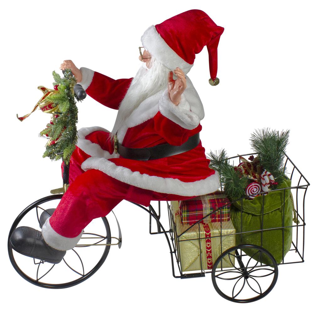 32" Pre-Lit LED Animated and Musical Santa Claus Riding a Tricycle Christmas Figurine. Picture 3