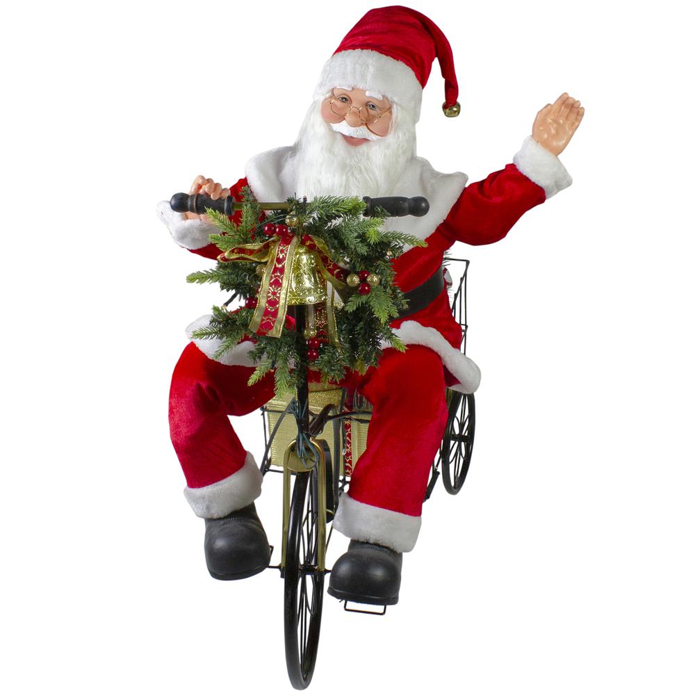 32" Pre-Lit LED Animated and Musical Santa Claus Riding a Tricycle Christmas Figurine. Picture 4