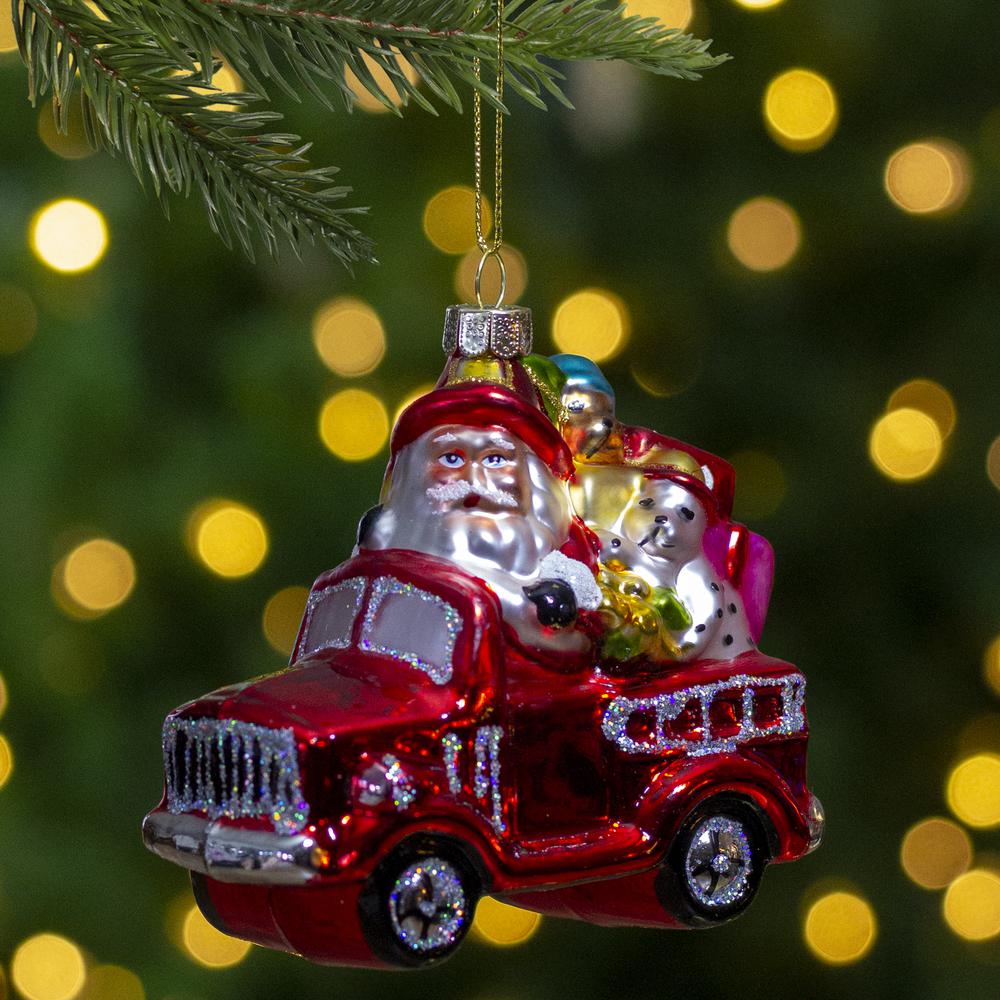 4" Red Fire Truck with Santa and Presents Glass Christmas Ornament. Picture 2