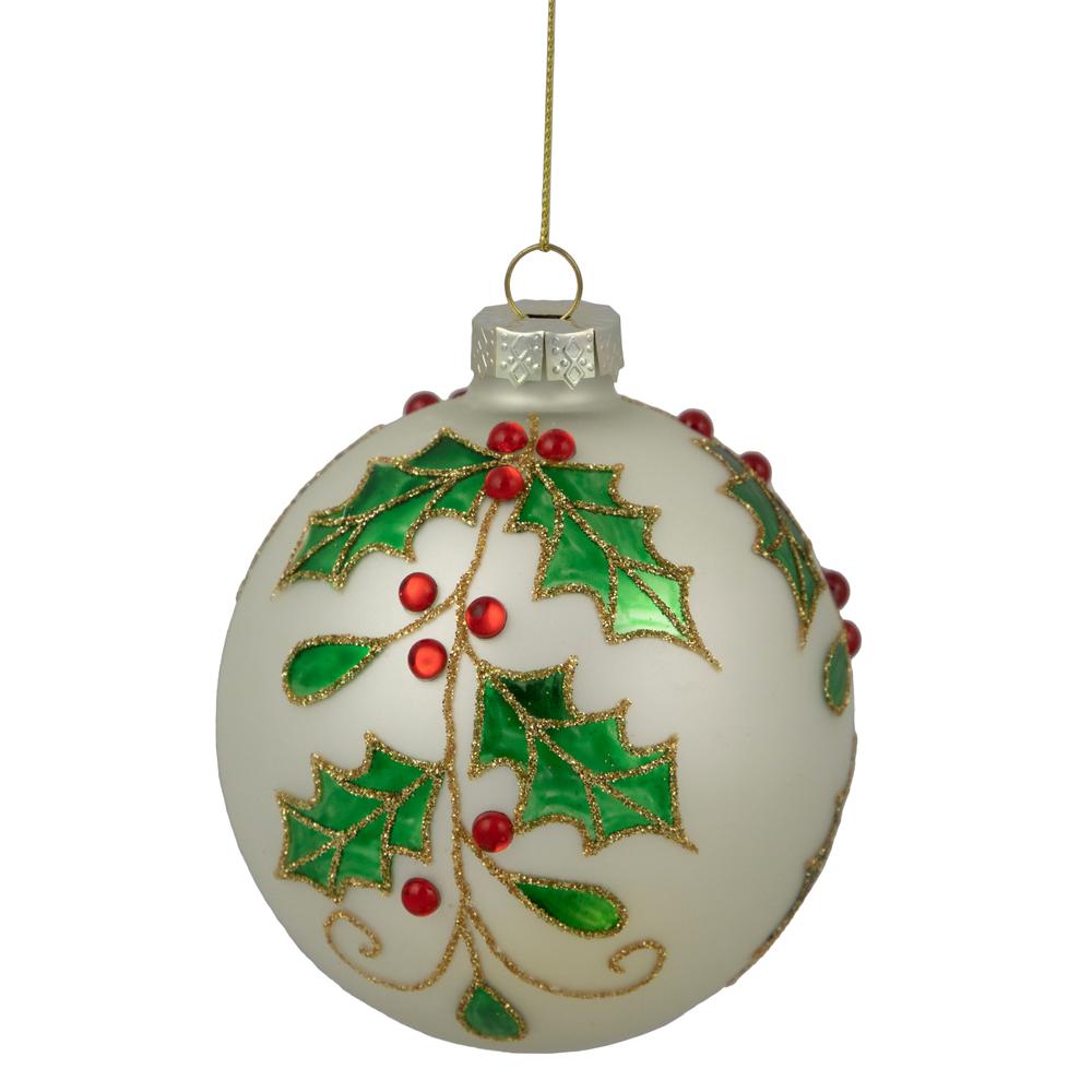4.5" White Glass Christmas Ball Ornament with Holly Leaves. Picture 1