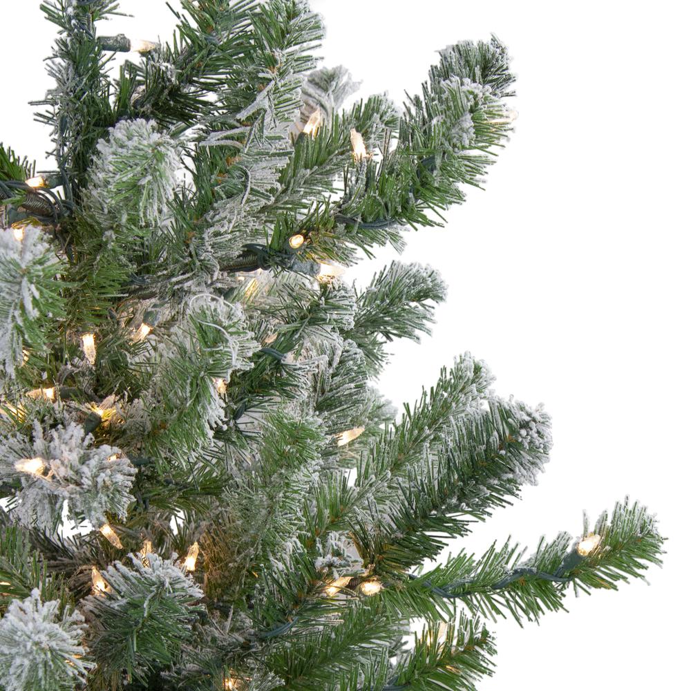 4.5' Pre-Lit Full Flocked Natural Emerald Artificial Christmas Tree - Warm Clear Lights. Picture 4