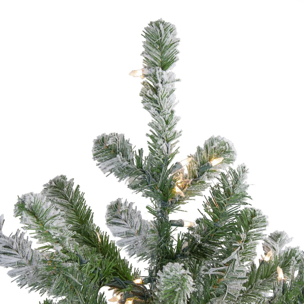 4.5' Pre-Lit Full Flocked Natural Emerald Artificial Christmas Tree - Warm Clear Lights. Picture 3