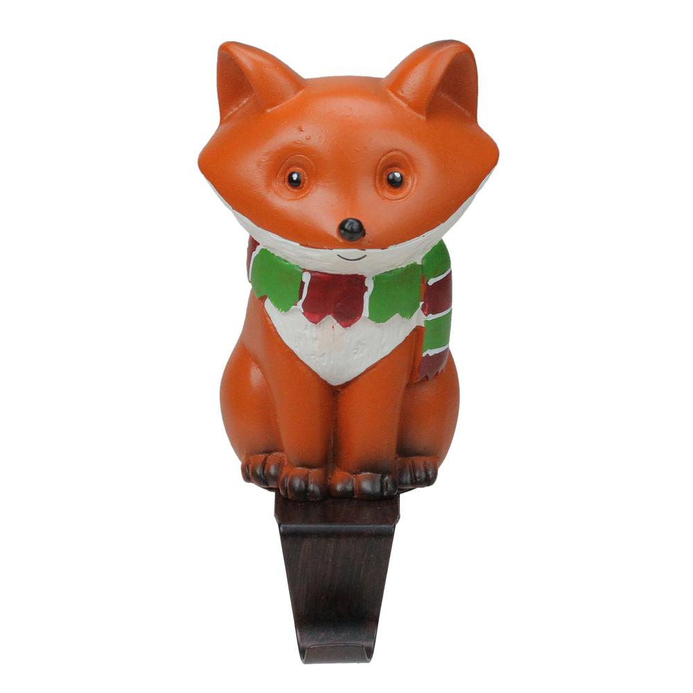 9" Standing Fox Wearing a Striped Scarf Christmas Stocking Holder. Picture 1
