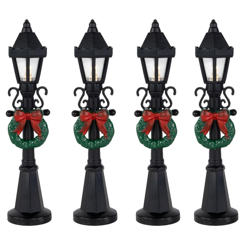 Set of 4 Lighted Street Lamps Christmas Village Display Pieces - 4.75". Picture 1