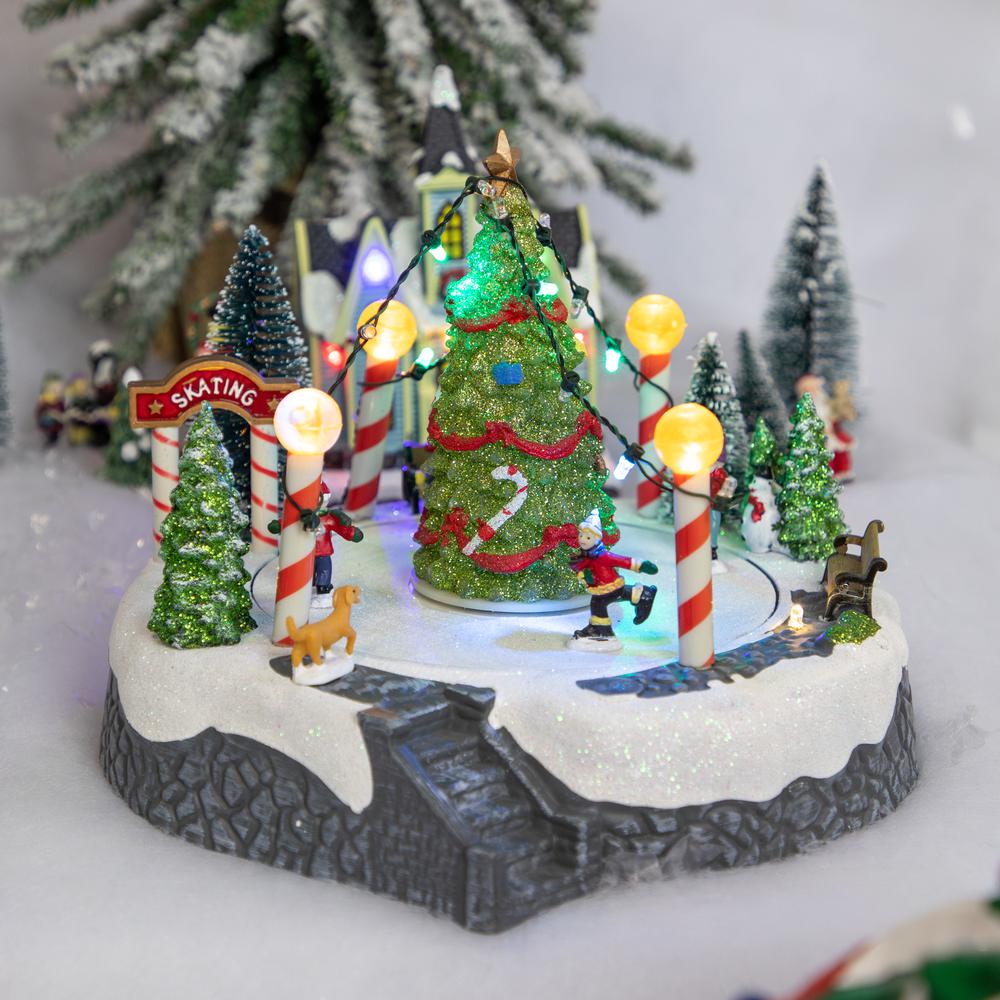 9" Animated and Musical Ice Skaters Christmas Scene LED Lighted Village Display. Picture 1