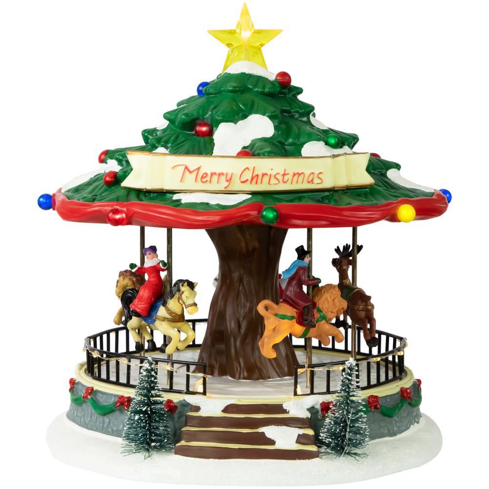 10.5" LED Lighted Musical and Animated Christmas Carousel Village Display. Picture 1