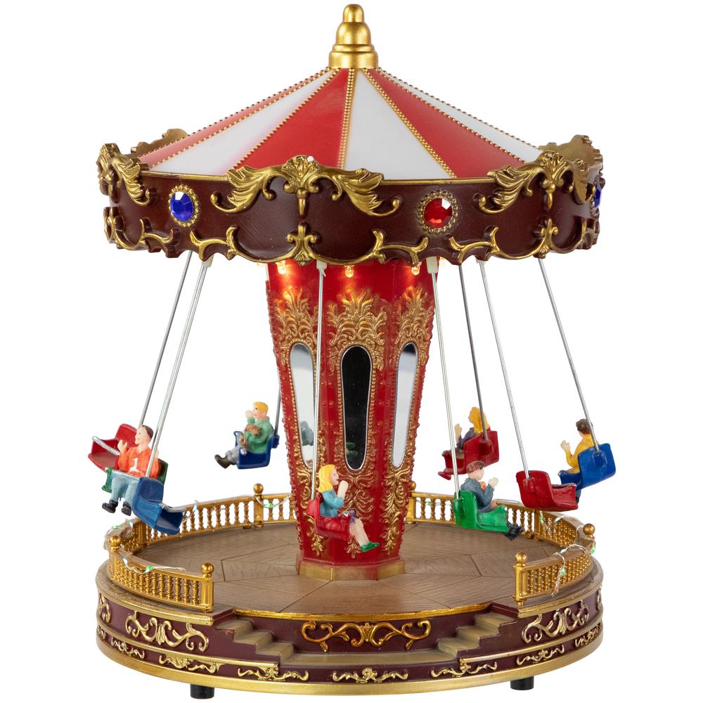 10.75" Animated and Musical Carnival Carousel LED Christmas Village Display. Picture 1