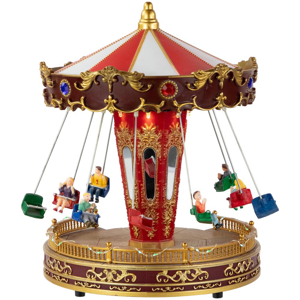 10.75" Animated and Musical Carnival Carousel LED Christmas Village Display. Picture 4