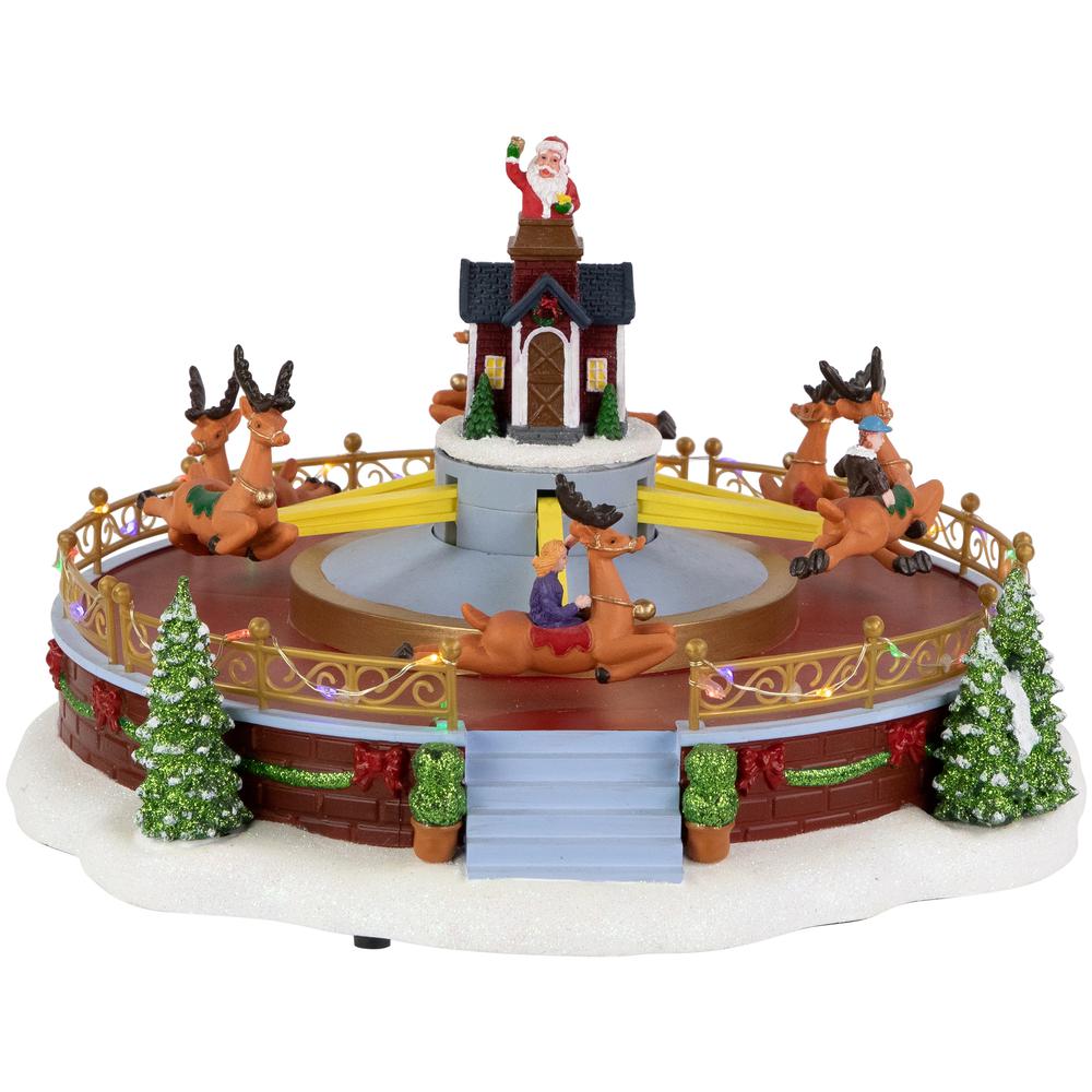 12" Animated and Musical Rockin' Reindeer Ride LED Christmas Village Display. Picture 1