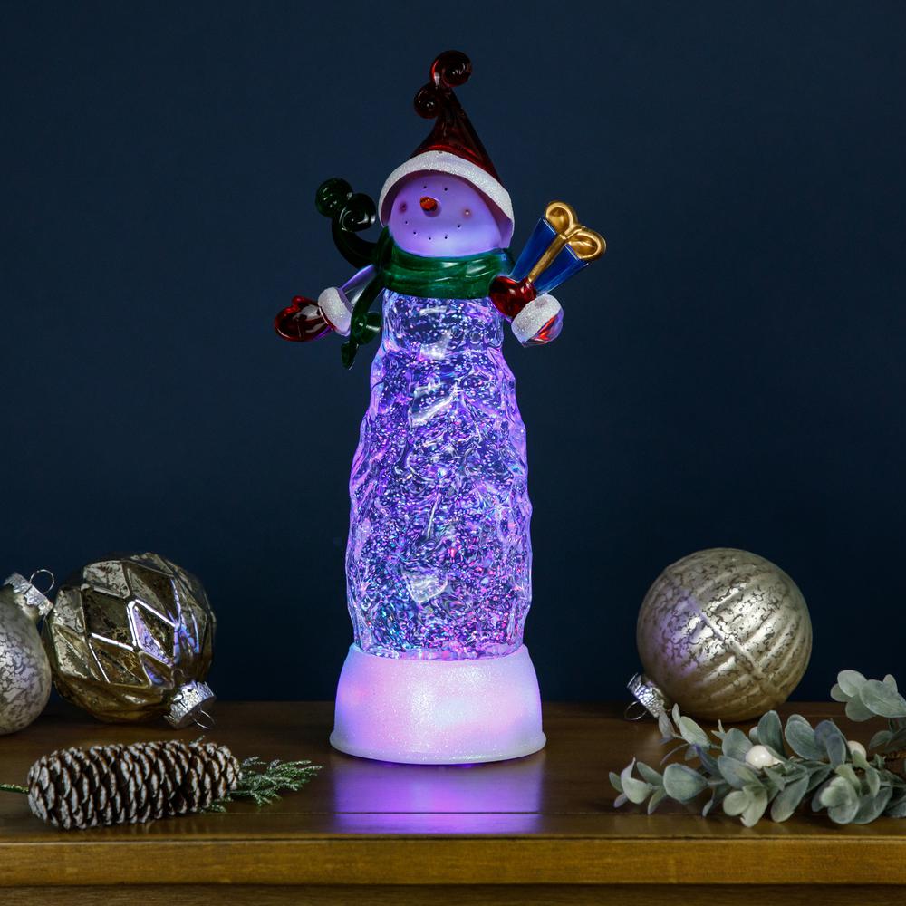 11.5" Pre-lit Snowman Swirling Glitter Christmas Snow Globe. Picture 2