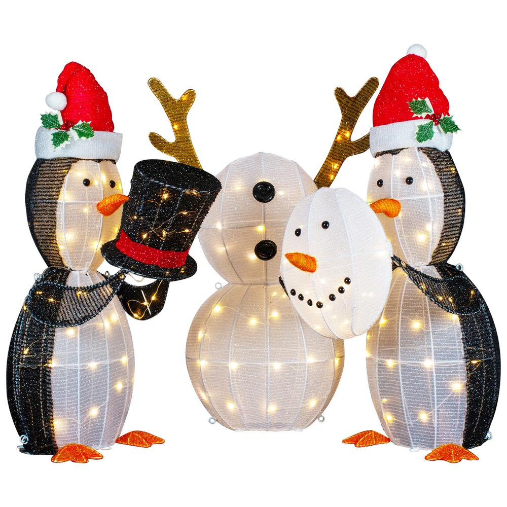 Set of 3 LED Lighted Penguins Building Snowman Outdoor Christmas Decoration 35". Picture 1