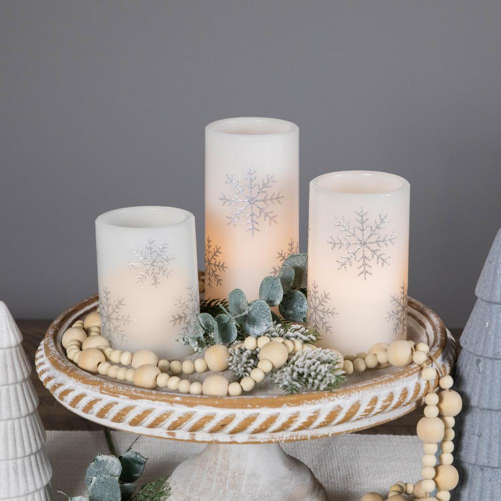 Set of 3 Flameless Silver Snowflakes LED Christmas Wax Pillar Candles 6". Picture 3