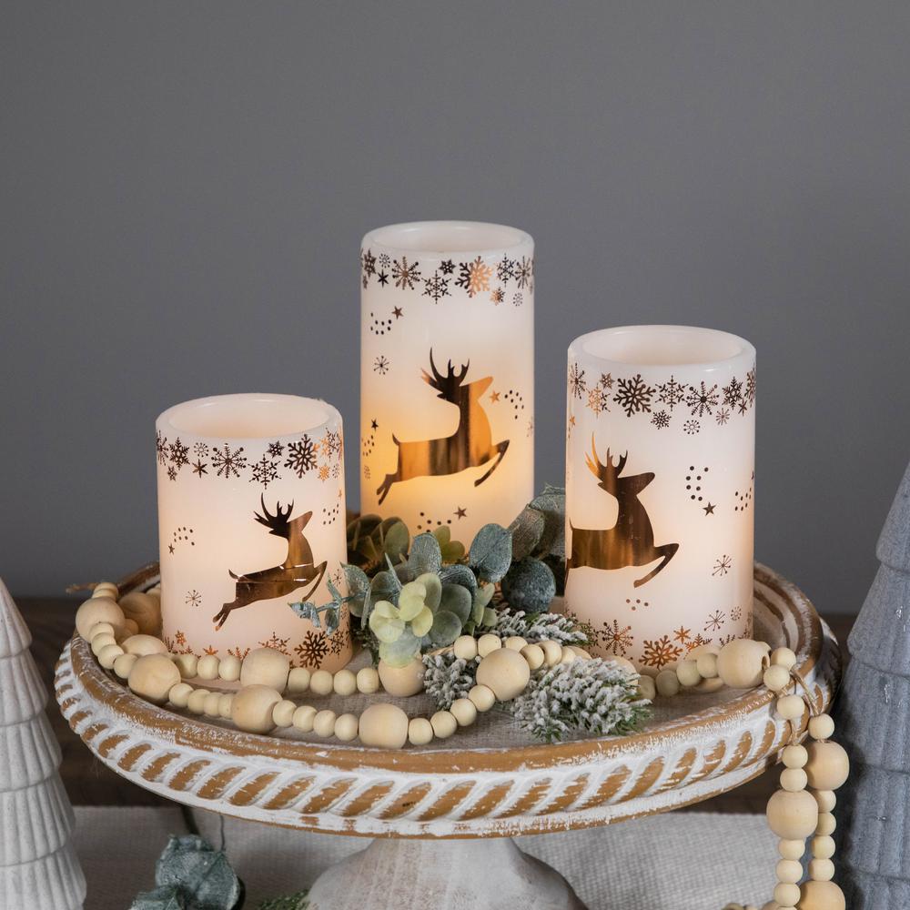 Set of 3 White Reindeer Flameless Flickering LED Christmas Wax Pillar Candles 6". Picture 3