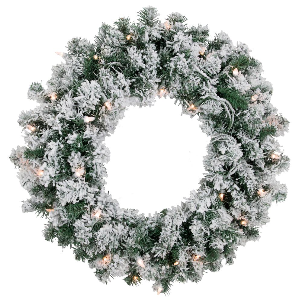 Pre-Lit Flocked Snow White Artificial Christmas Wreath  24-Inch  Clear Lights. Picture 1