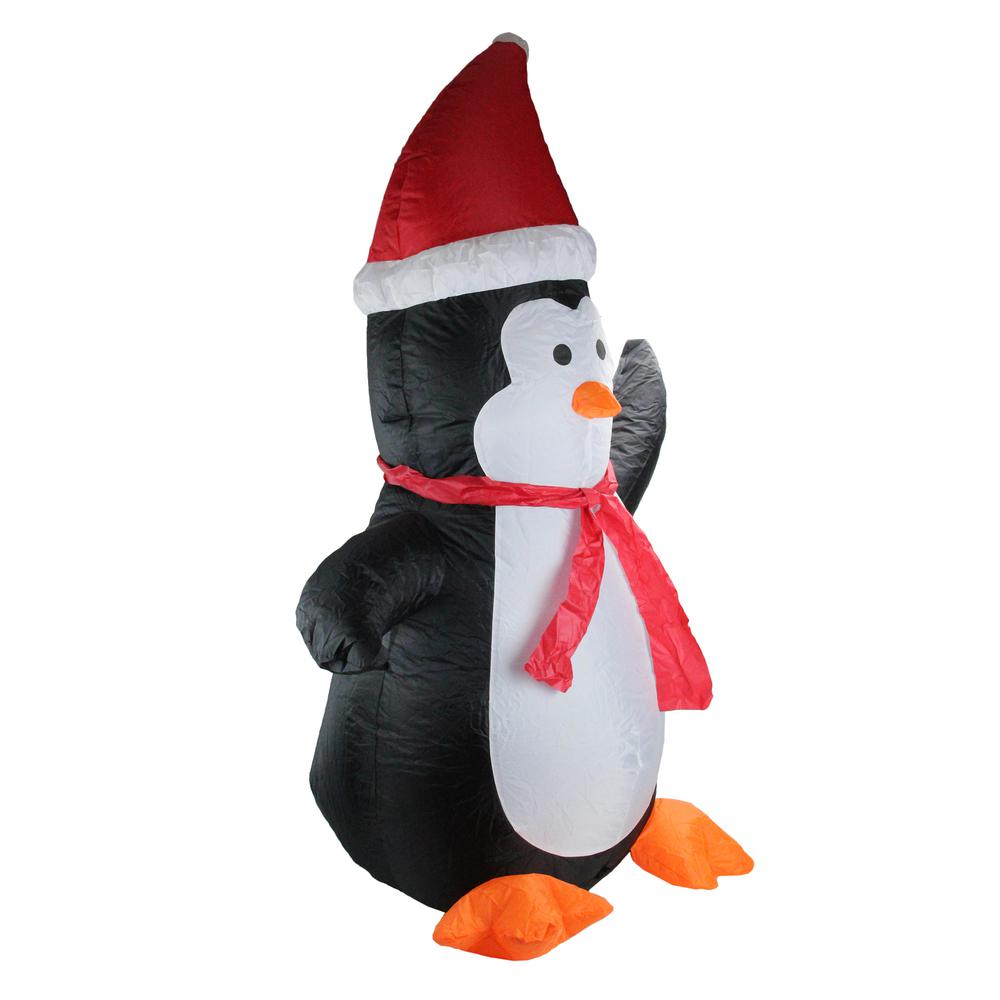 4' Black and White Inflatable Festive Penguin Christmas Yard Decor. Picture 2