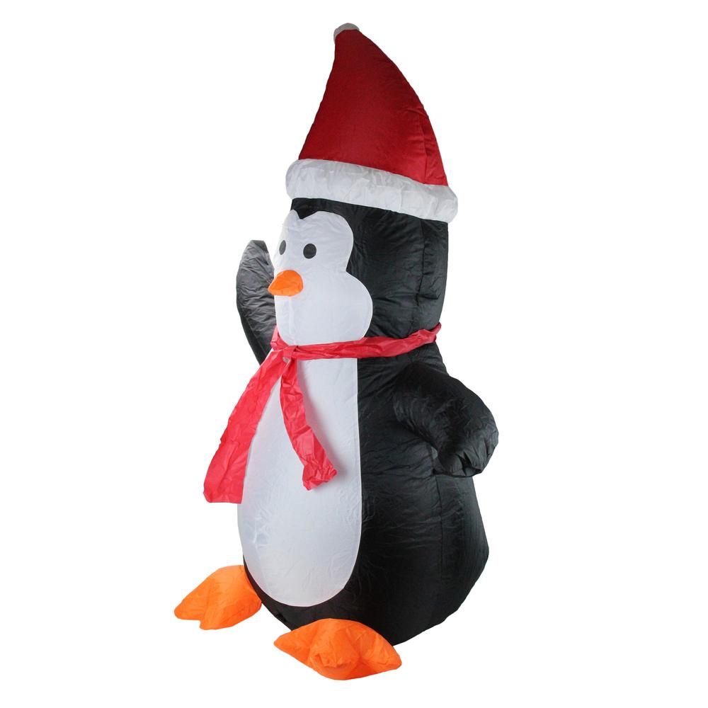 4' Black and White Inflatable Festive Penguin Christmas Yard Decor. Picture 3