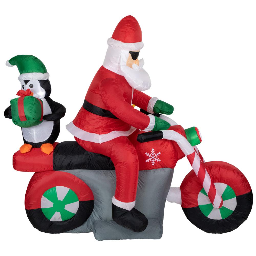 5' Inflatable Lighted Santa and Penguin on Motorcycle Outdoor Christmas Decoration. Picture 1