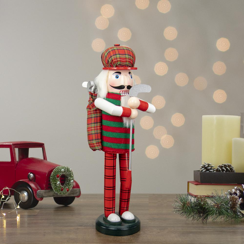 14" Red and Green Plaid Wooden Golfer Christmas Nutcracker. Picture 2