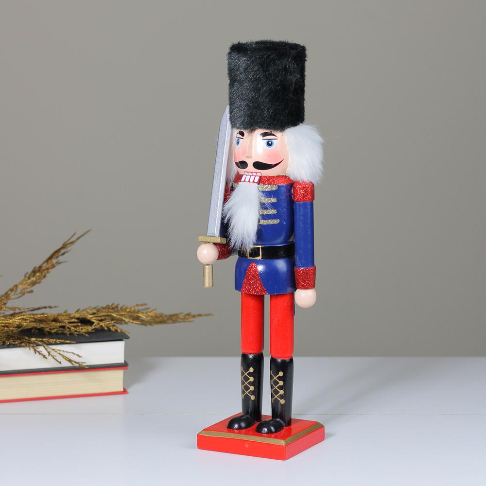 14" Red and Blue Christmas Nutcracker Soldier with Sword. Picture 3