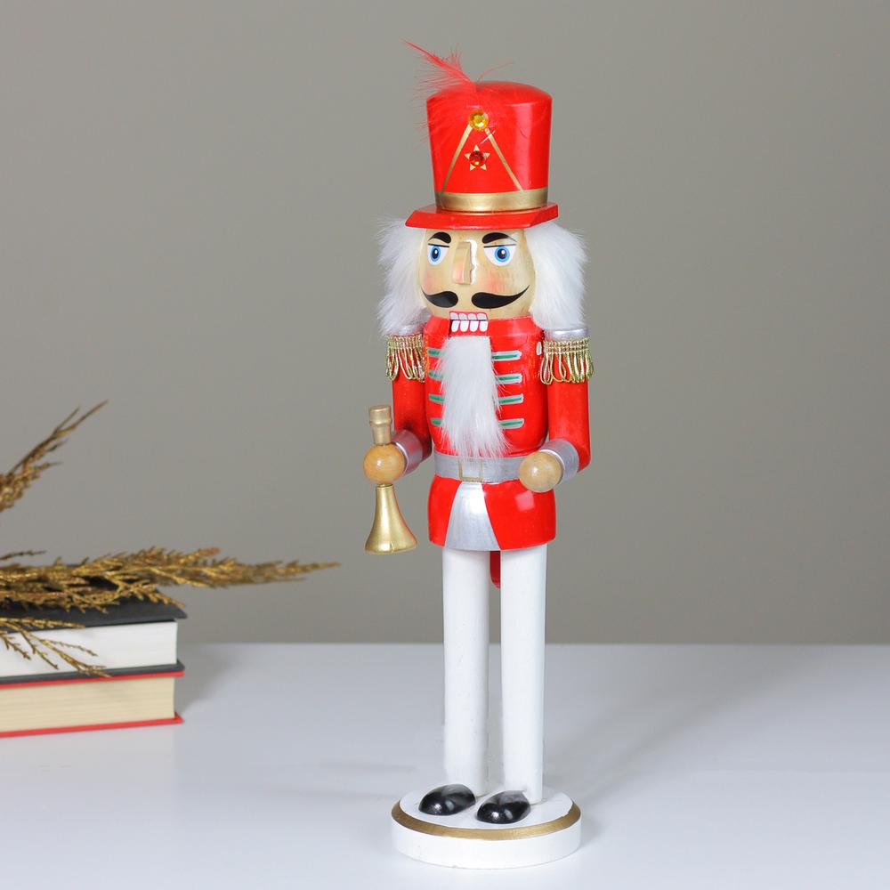 14" Red and White Wooden Christmas Nutcracker with Horn. Picture 3