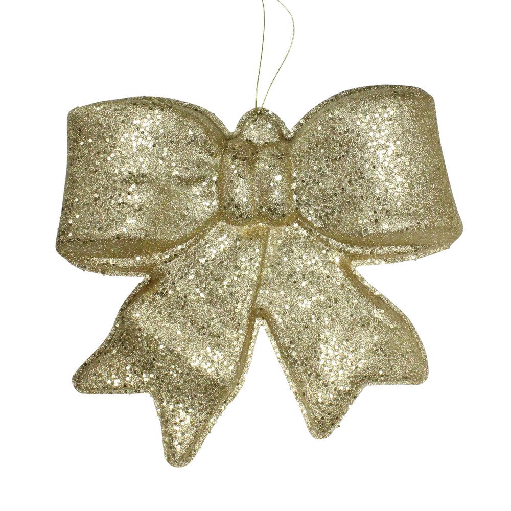16" Gold Glittered Battery Operated Lighted LED Bow Christmas Decoration. Picture 1